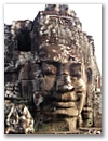 Eines von 216 Gesichtern im Bayon Tempel von Angkor.