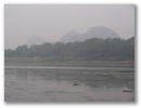 Guilin - Karsthuegel im tropischen Nebel